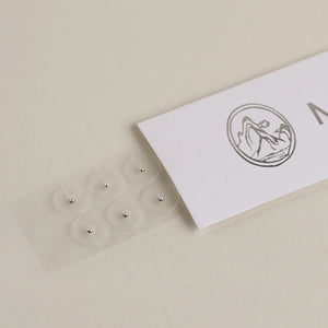 Mount Lai stainless steel acupressure ear seeds close-up